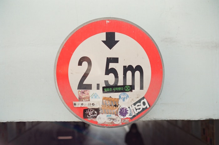 #608 red and white round sign