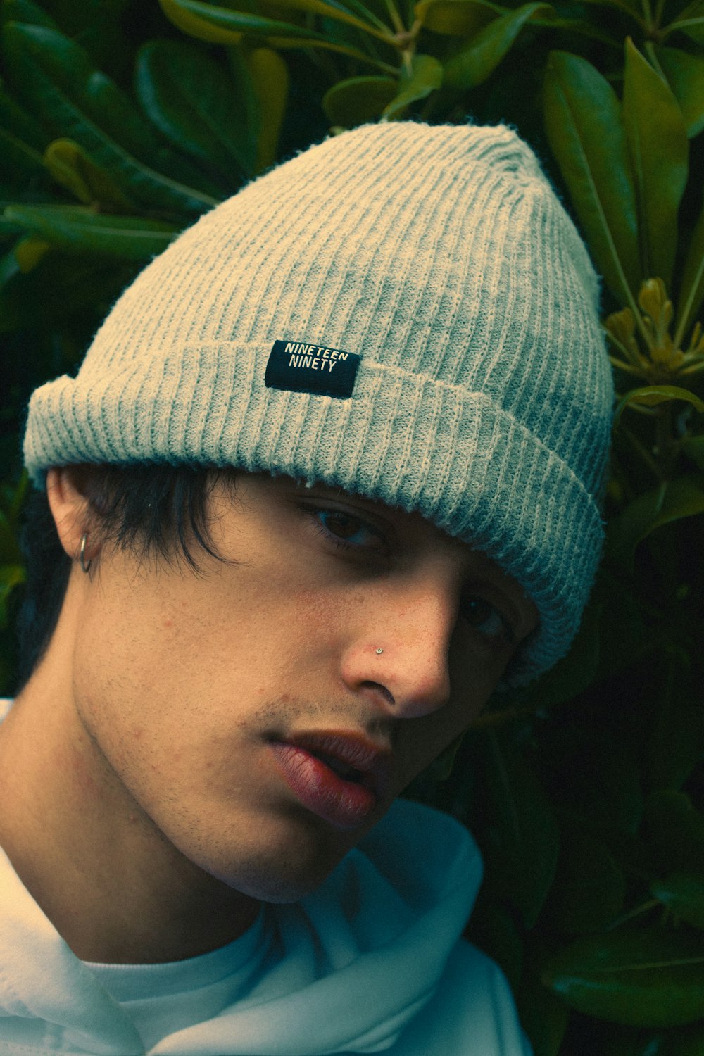 man in gray knit cap