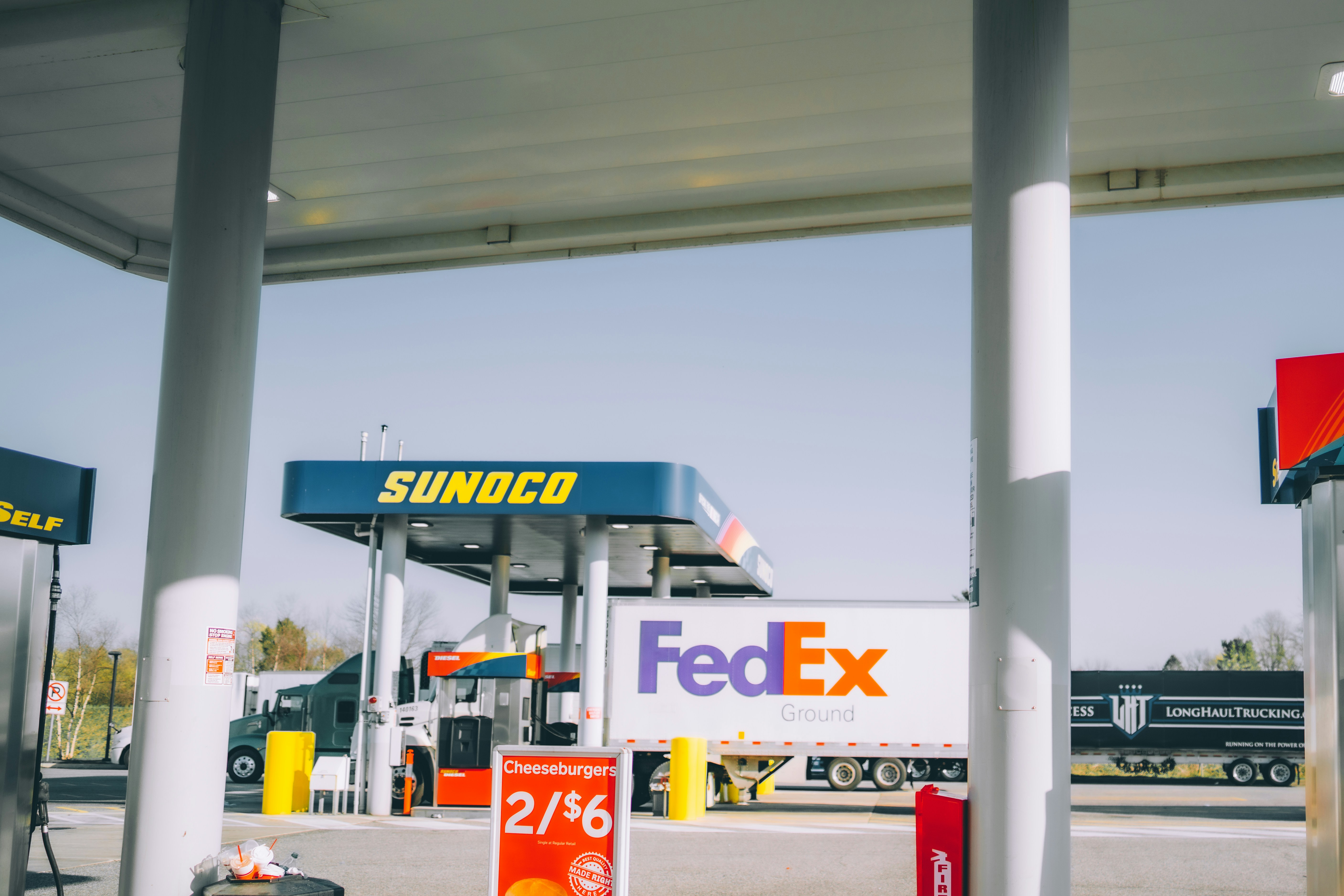 white and blue gas station