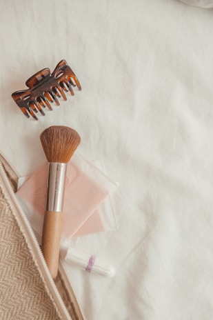 brown and silver makeup brush