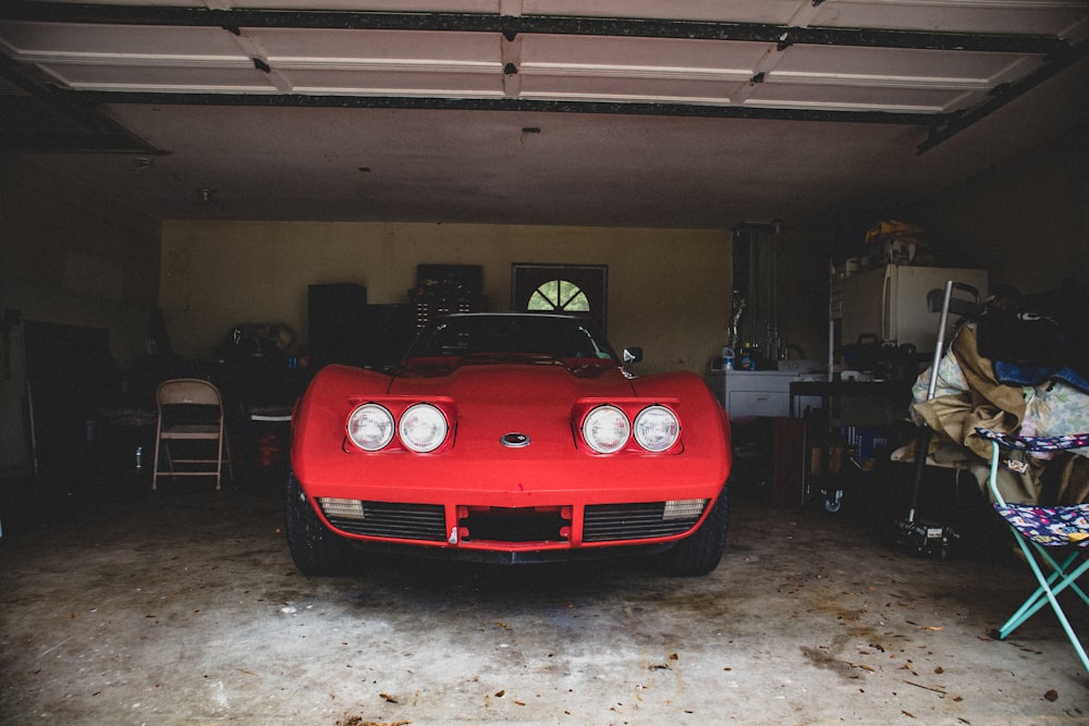 red bmw car in garage