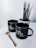 black and white ceramic mug