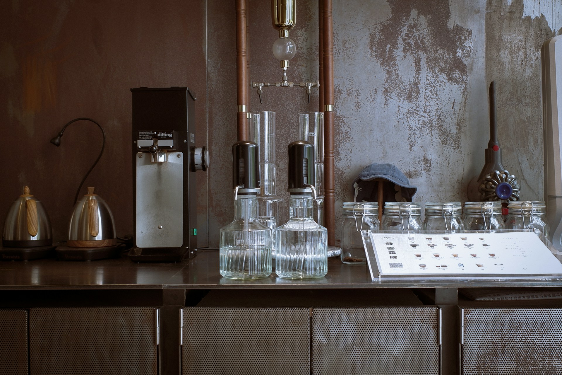 clear glass pitcher on brown wooden table