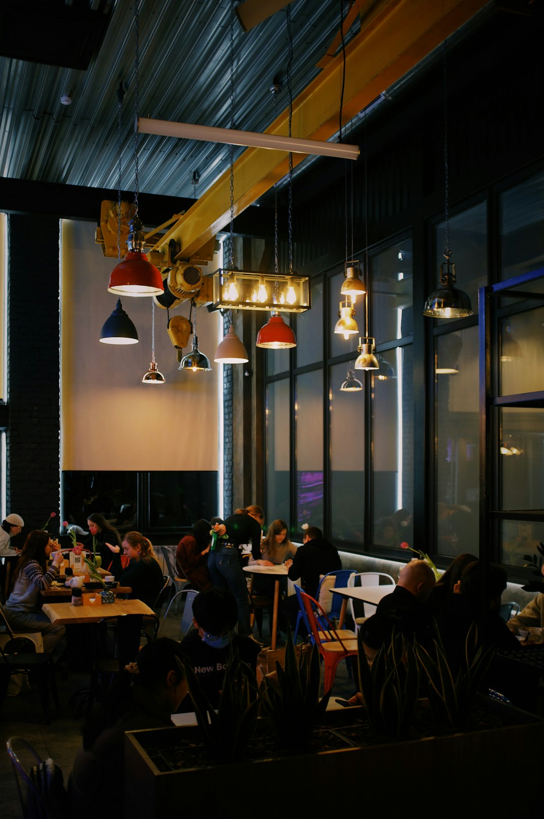 people sitting on chair inside restaurant