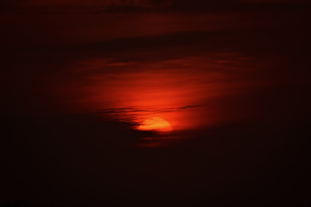 red and orange light on dark room