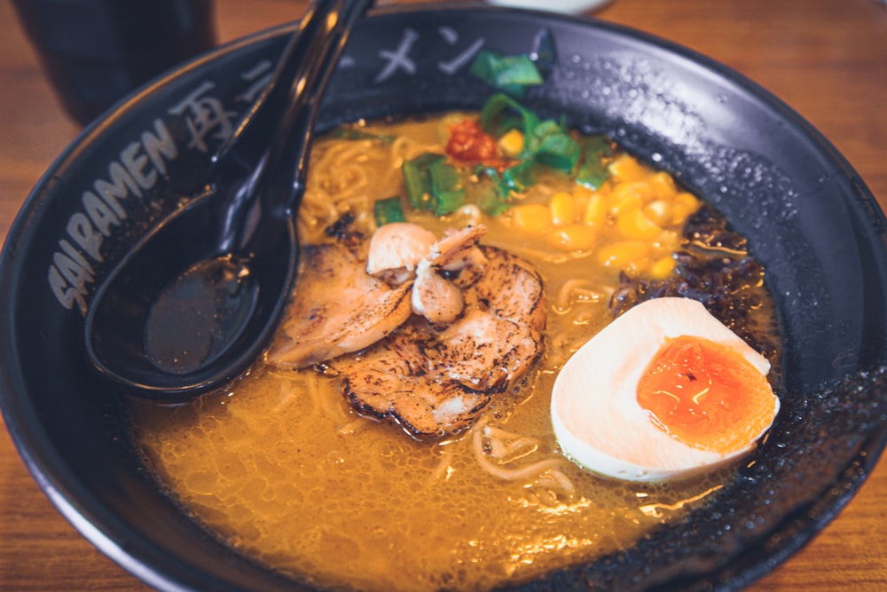 cooked food with stainless steel spoon