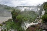 A stunning view of the Iguaçu Falls surrounded by lush greenery.
