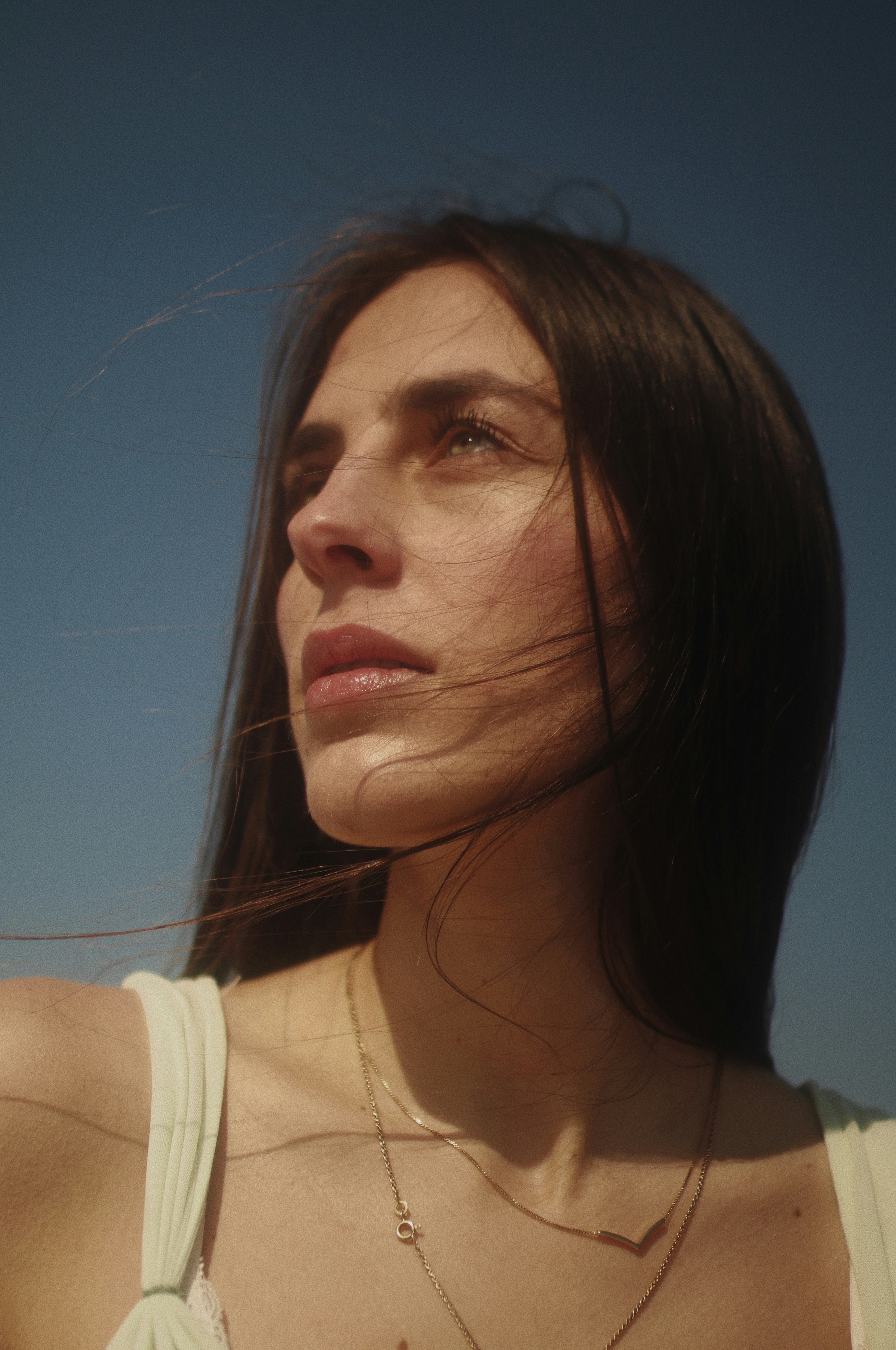 woman in white tank top