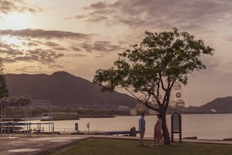 The couple sharing a quiet moment at a traditional Vietnamese lantern festival