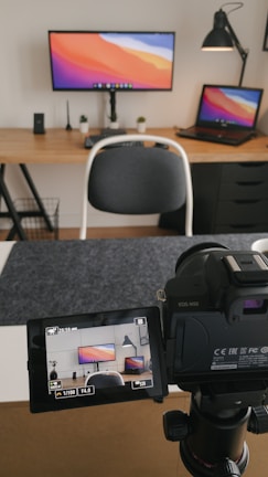 Top-down shot of a minimalist workspace featuring the equipment.
