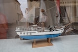 A modern styled wooden model ship showcasing contemporary craftsmanship.