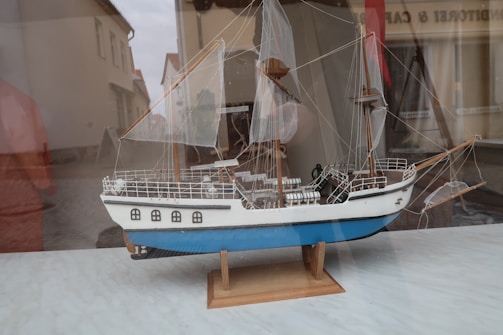 A modern styled wooden model ship showcasing contemporary craftsmanship.
