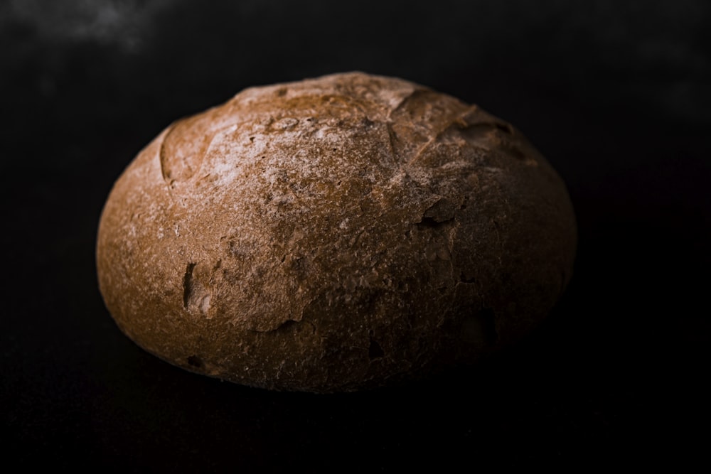brown bread on black surface