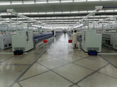 Spacious production area with spotless surfaces and well-maintained machinery.