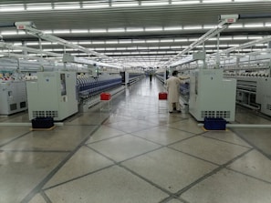 A panoramic view of the veontiles state-of-the-art manufacturing facility bustling with activity.