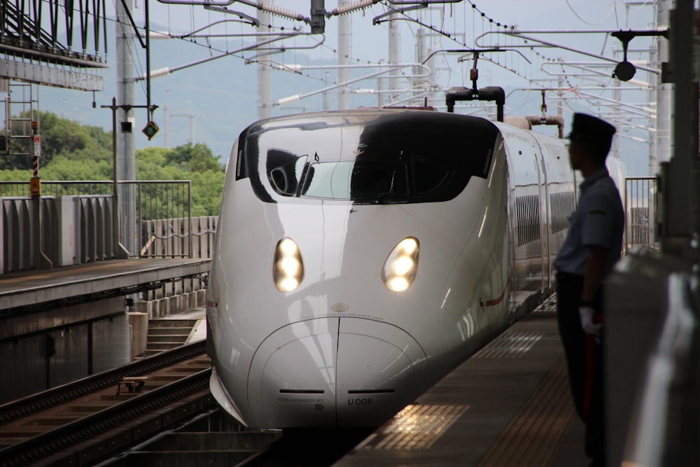 white and black train on rail