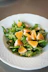 sliced orange fruits on white ceramic bowl