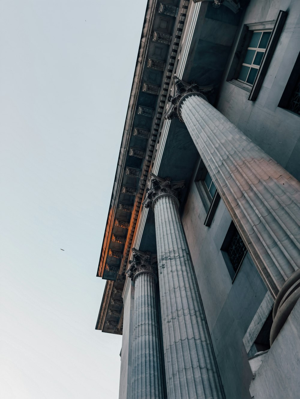 low angle photography of gray concrete building