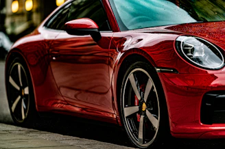 red ferrari 458 italia parked on road during daytime