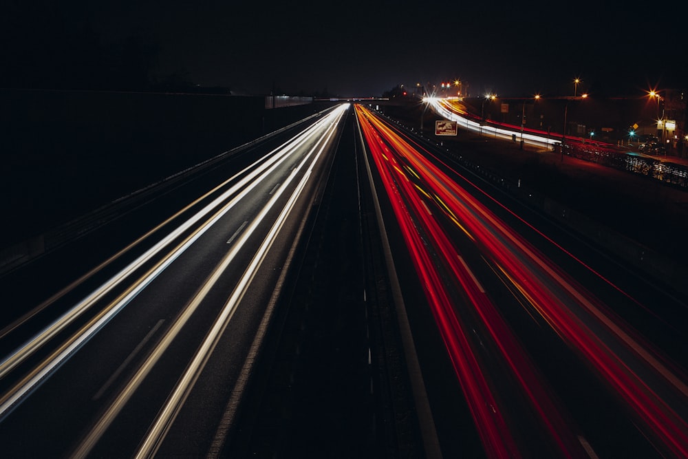 time lapse photography of cars on road during night time