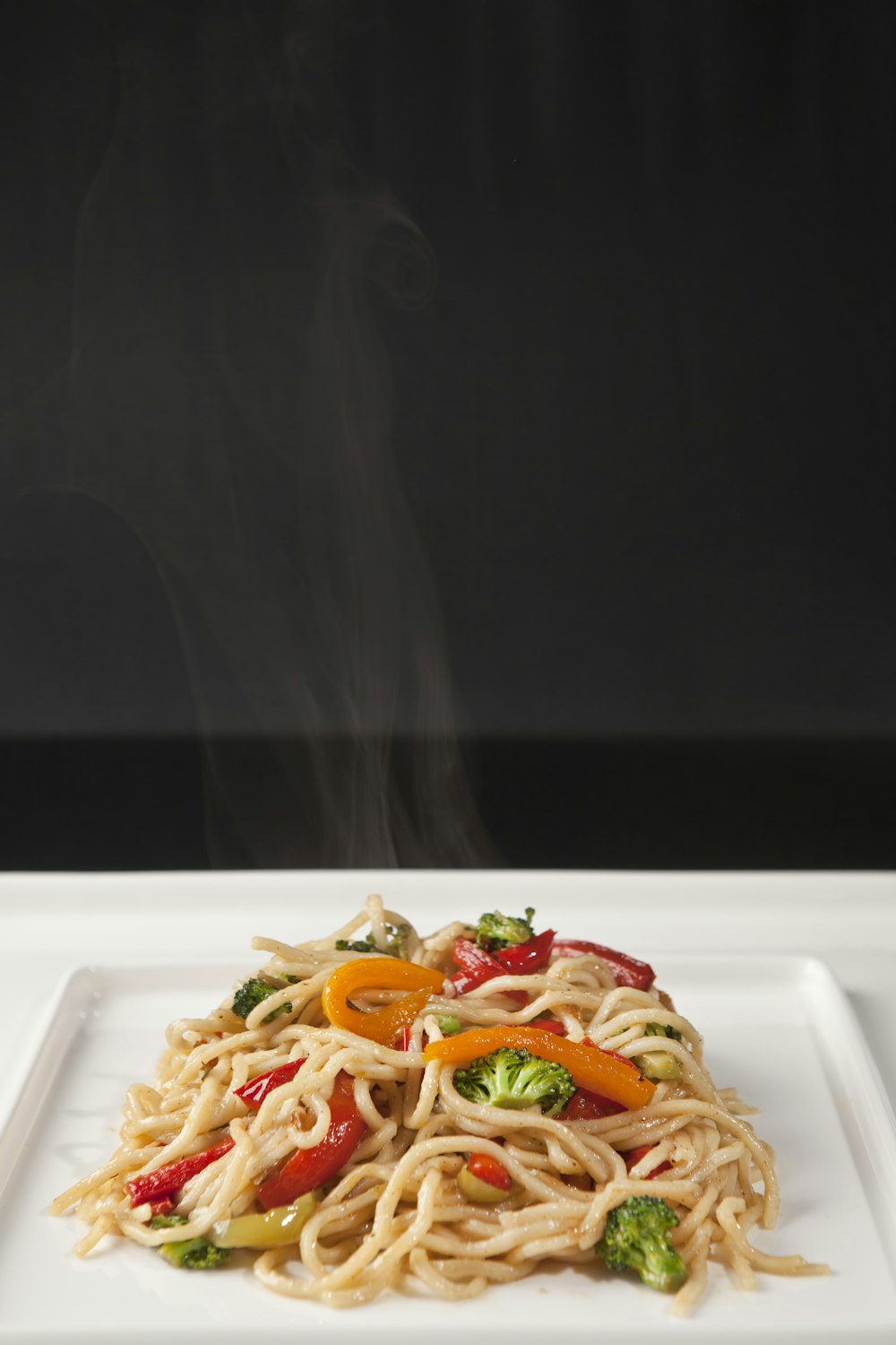 white ceramic plate with pasta dish