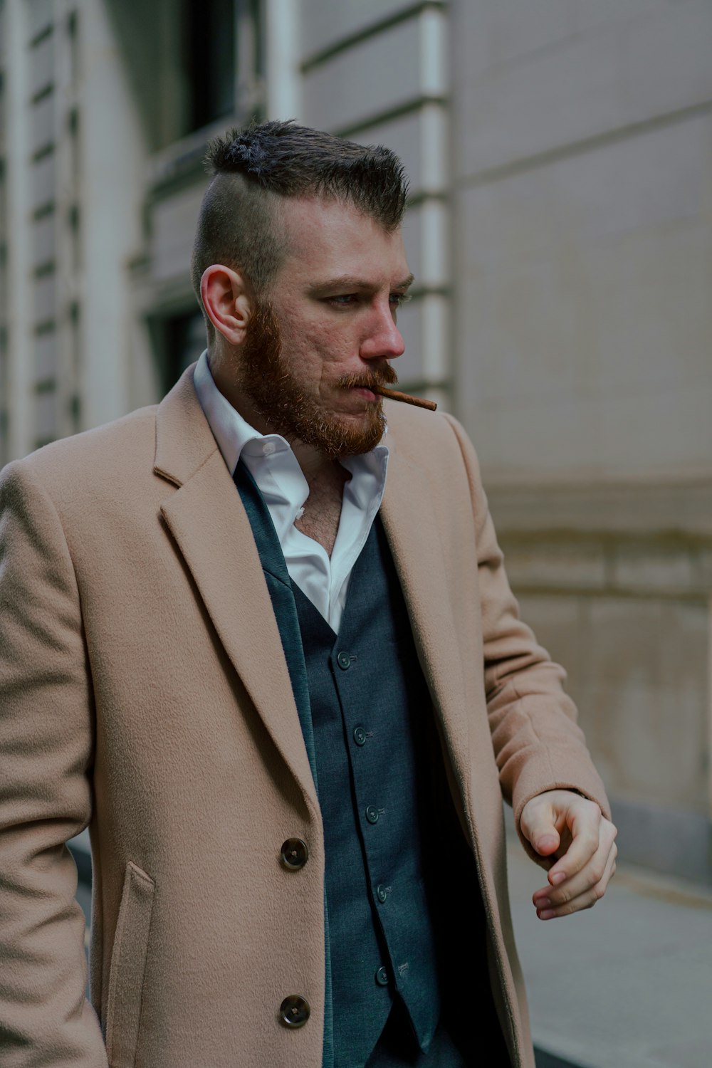 man in brown suit jacket