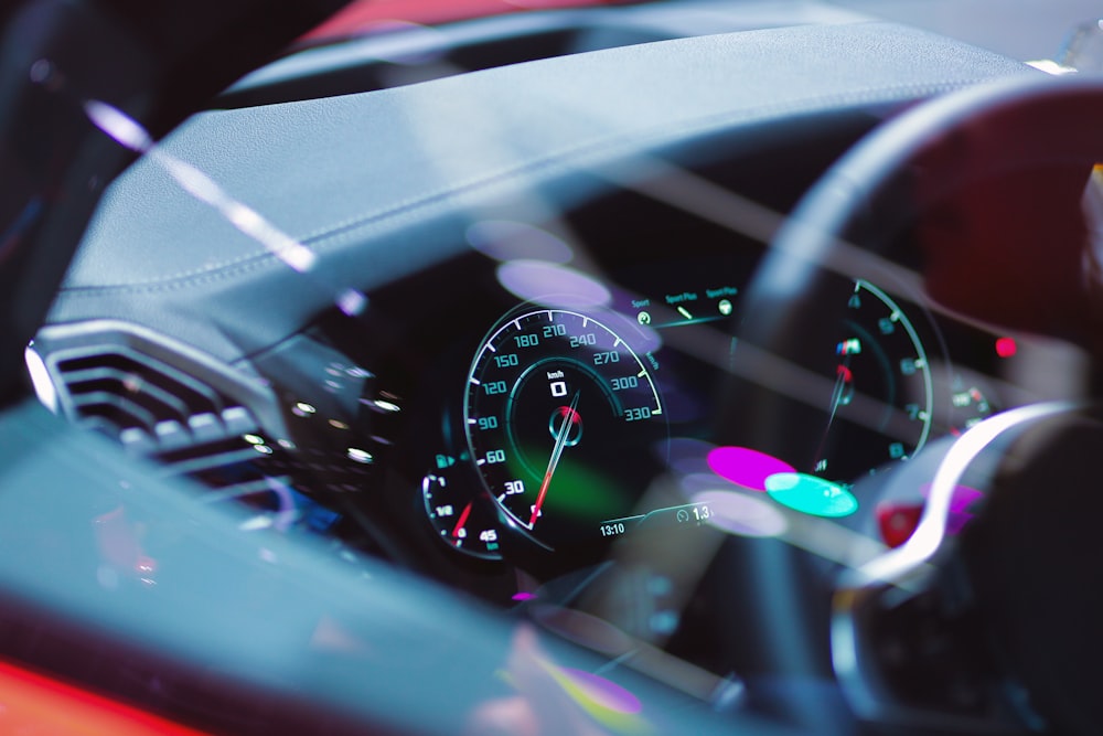 black and red car steering wheel