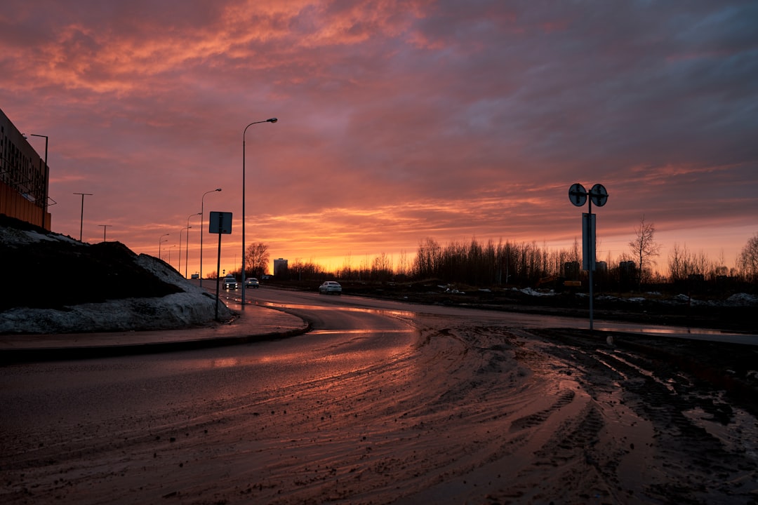 road with street light during sunset