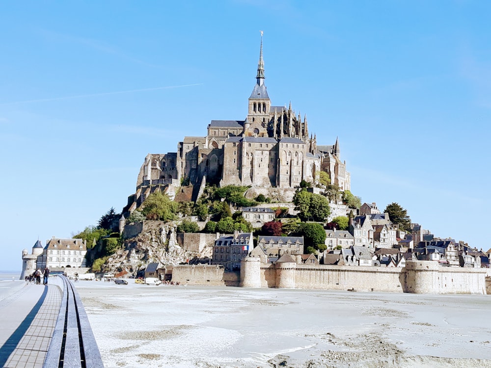 gray concrete castle under blue sky during daytime