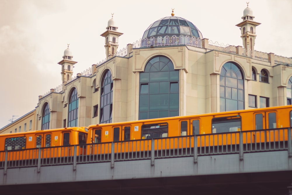 yellow and black train on rail