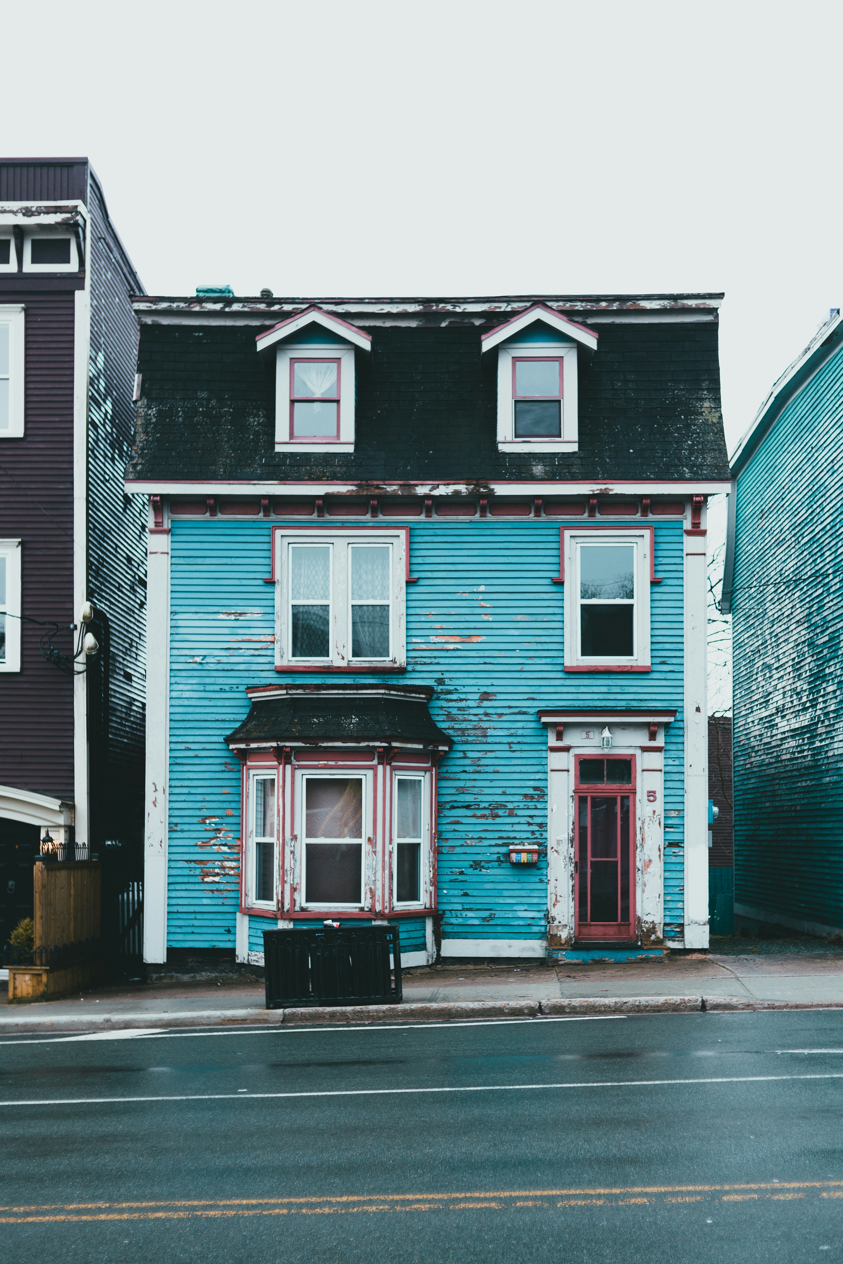 woman wearing yellow long-sleeved dress under white clouds and blue sky during daytime
