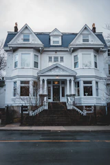 Elegant historic home with classic architecture and a welcoming porch.