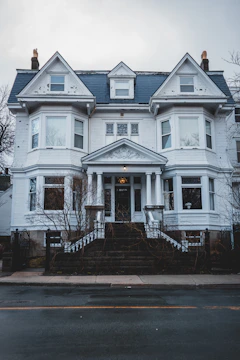 Elegant historic home with classic architecture and a welcoming porch.