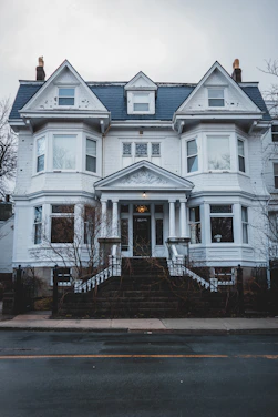 A beautifully restored historic home with classic architectural details and fresh paint.