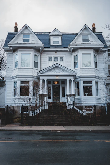 A beautifully restored historic home with classic architectural details and fresh paint.
