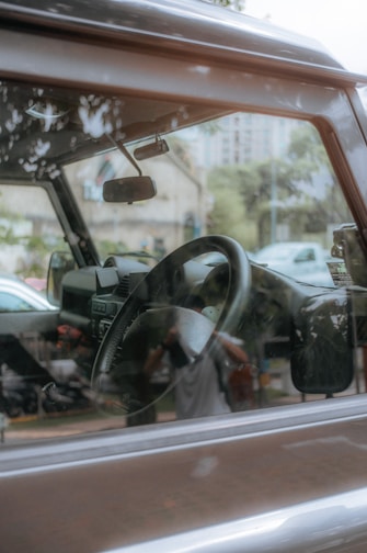 a truck with a steering wheel and a dashboard