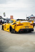 yellow ferrari 458 italia on road during daytime