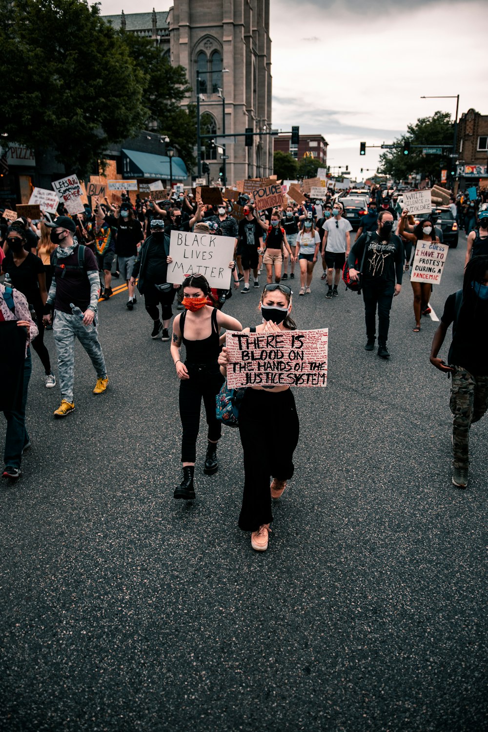 people holding white printer paper during daytime