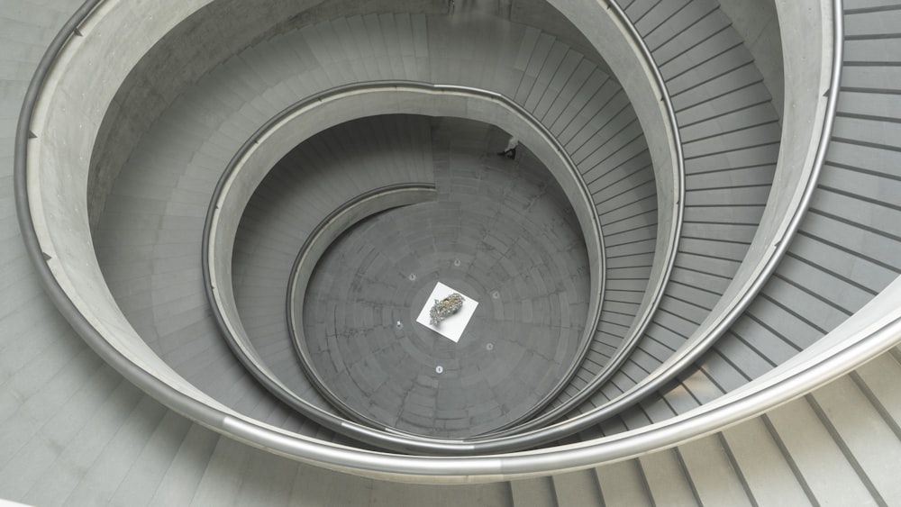 gray spiral stairs with no people