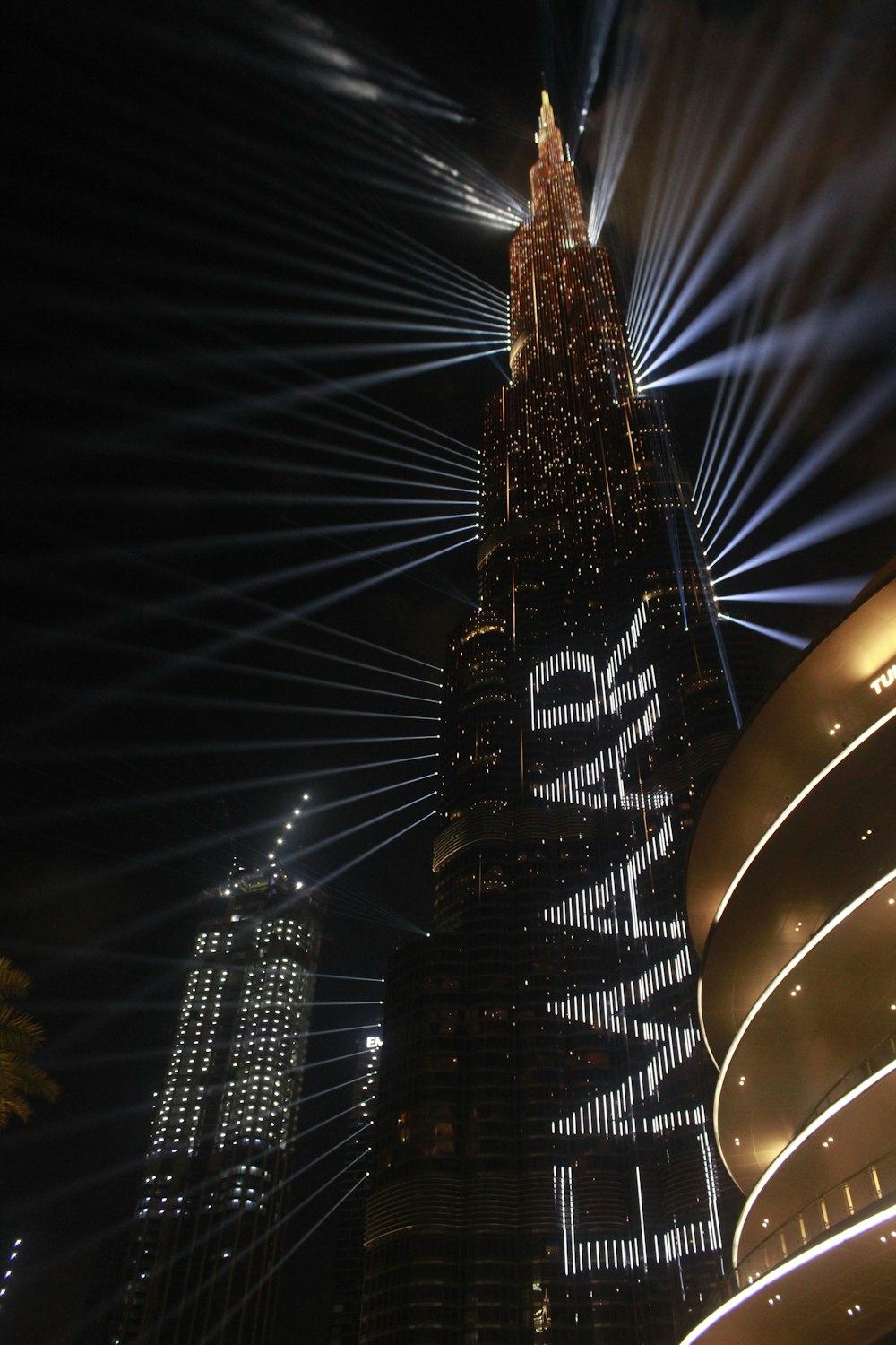 lighted high rise building during night time