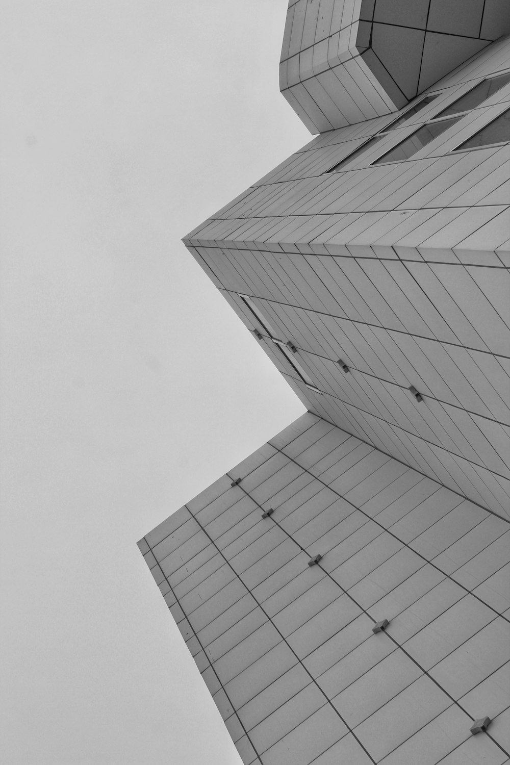 grayscale photo of high rise building