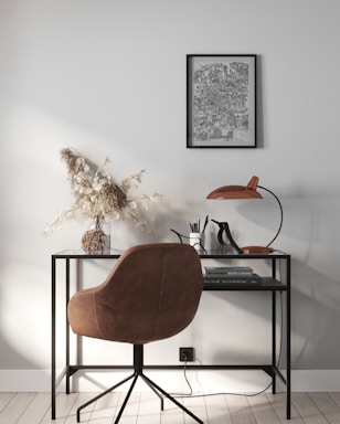 brown wooden chair beside black wooden table