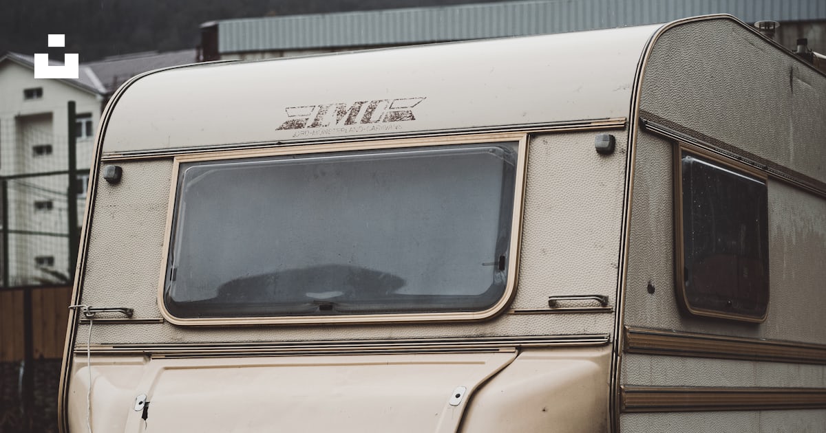 White and brown rv on water photo – Free Wallpaper Image on Unsplash
