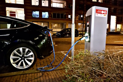 An electric vehicle charging station in an urban setting.