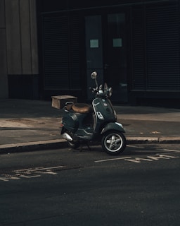 man in black jacket riding on black motorcycle
