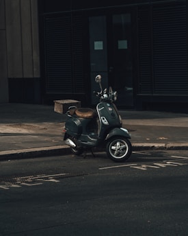 man in black jacket riding on black motorcycle