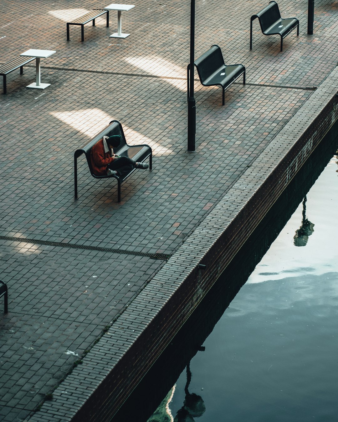 black and red chair on dock