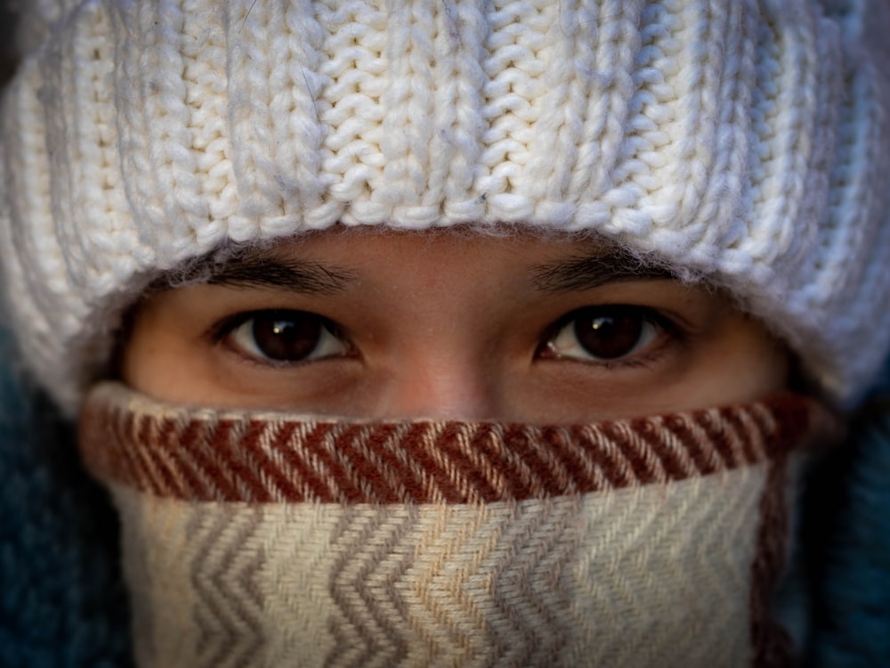 woman with white knit cap