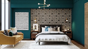 white bed cover on bed