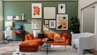 orange and black sofa with throw pillows